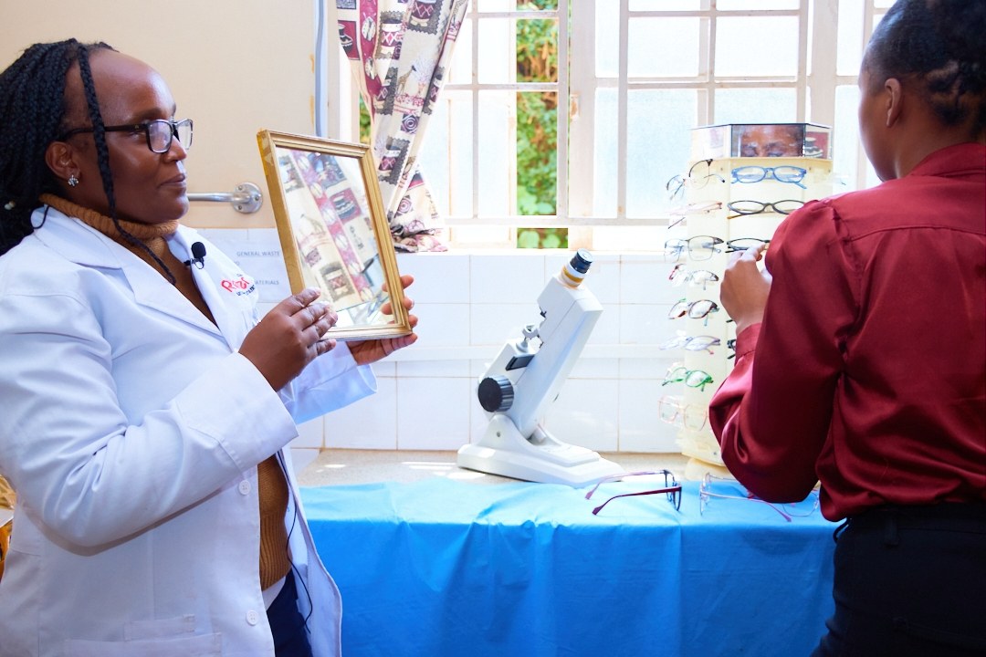 Medical staff assisting a patient